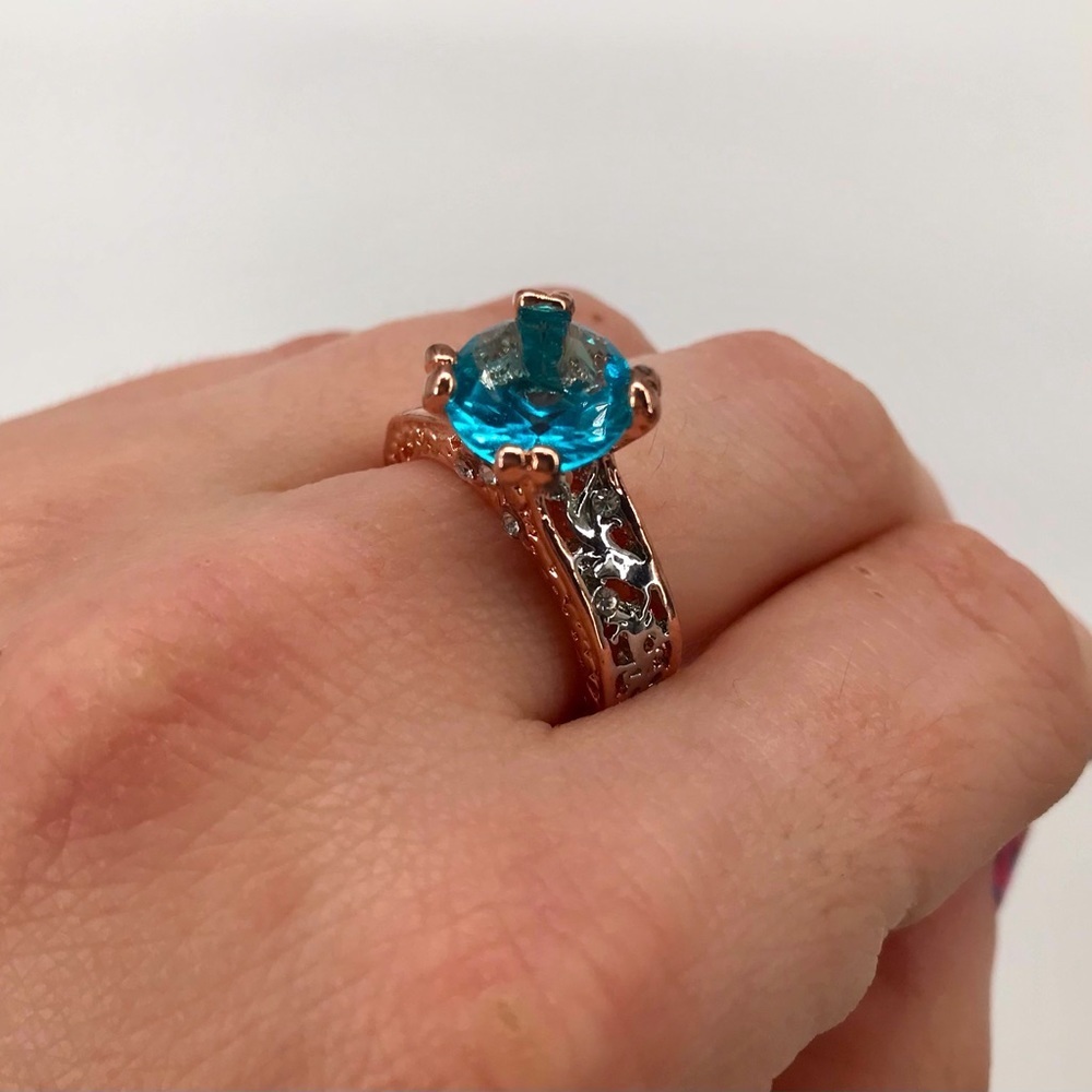 Mixed Metal Solitaire Ring with Blue Stone